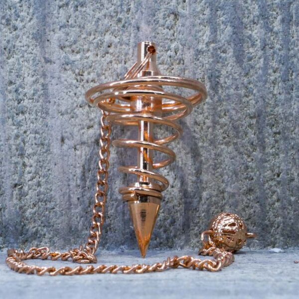 PENDULE METAL TOUPIE ROSE